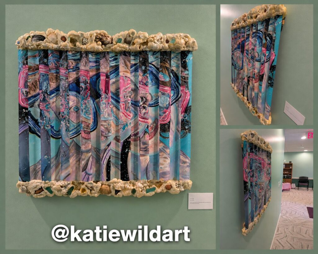 A wall piece of pleated painted strips in blue and pink, edged top and bottom with shells and sea glass, shown front on and from two angles