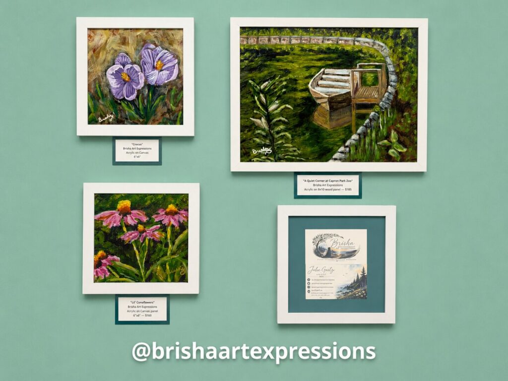Four framed pieces by Brisha Art Expressions with their labels: purple crocuses, a boat beside a marsh garden, coneflowers and the artist's card